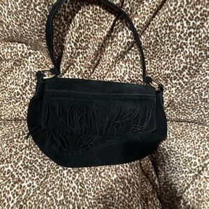 Black fringed suede guess purse used a couple of times in great shape